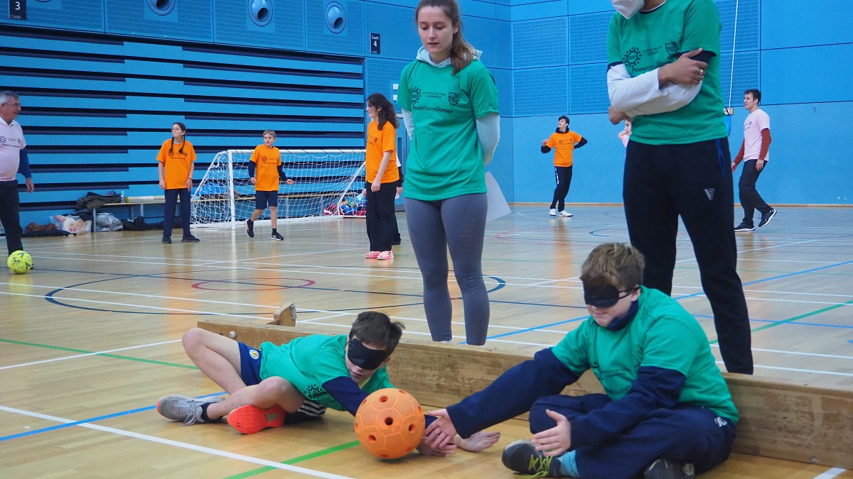 Goalball and walking football in the background